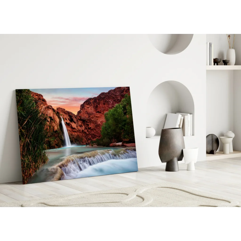 Stunning glass wall art of waterfall in red canyon cliffs