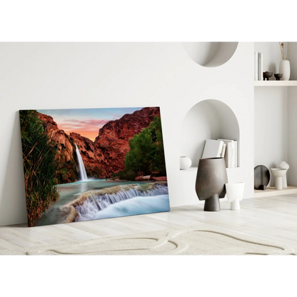 Stunning glass wall art of waterfall in red canyon cliffs