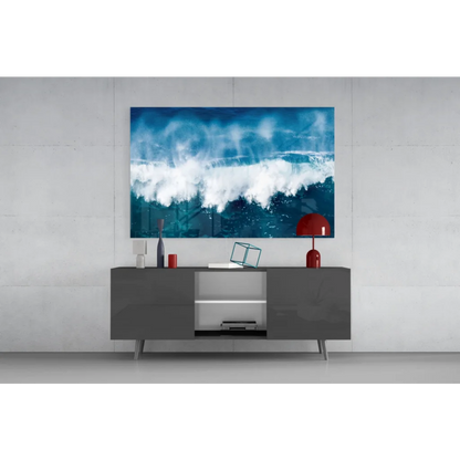 Vibrant blue wave glass wall art above modern gray console table