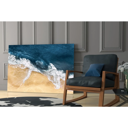 Ocean waves aerial view glass wall art crashing on sand