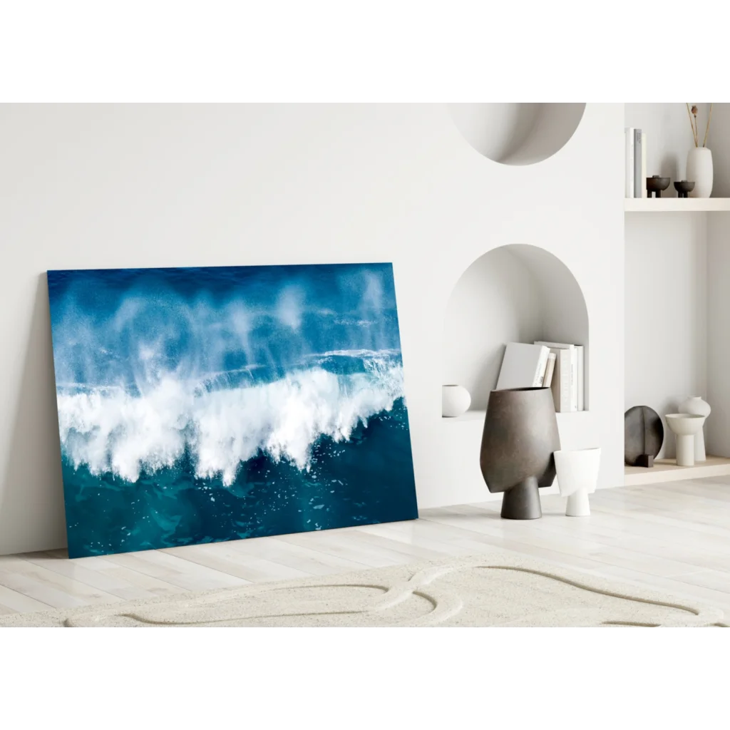 Stunning blue wave glass wall art on minimalist white wall