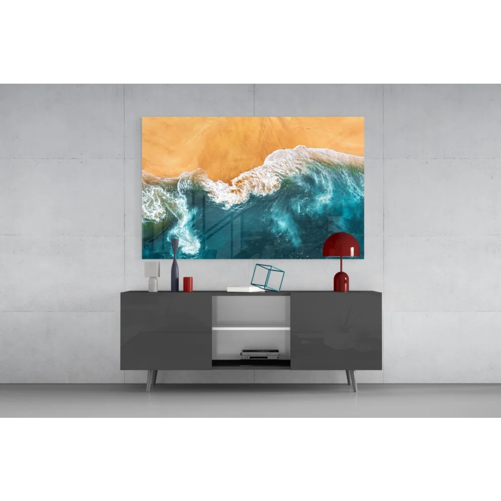 Turquoise waves glass wall art print with ocean foam and golden sand