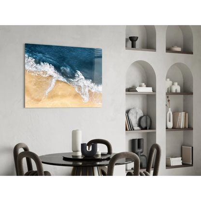 Dynamic ocean wave crashing on golden sand glass wall art print