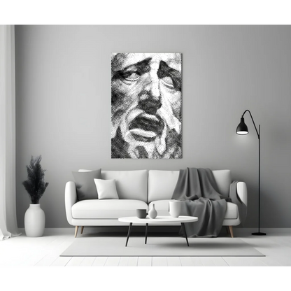Black and white wavy line portrait wall art above minimalist sofa