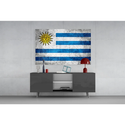 Weathered Uruguay flag wall art canvas with sun, stripes on gray table