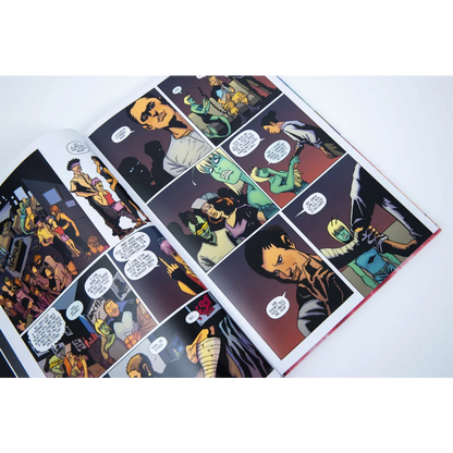 Open comic book with colorful illustrations and dialogue bubbles from Weird Times at Quarry Bank University