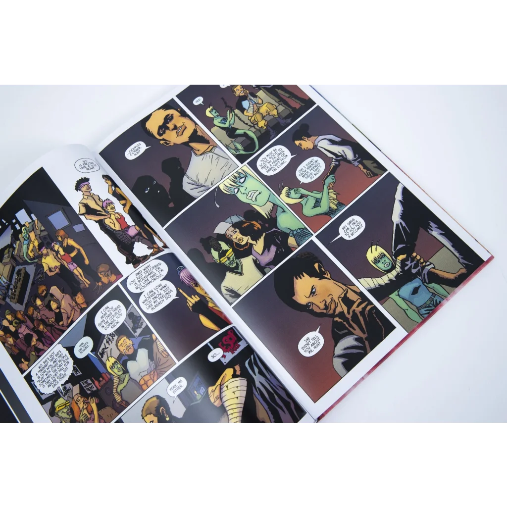 Open comic book with colorful illustrations and dialogue bubbles from Weird Times at Quarry Bank University