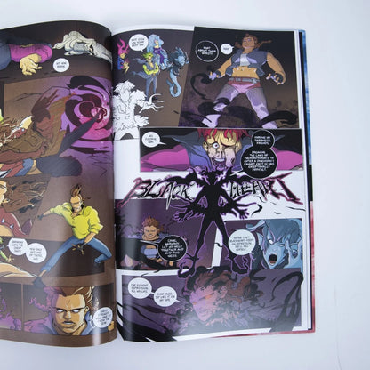 Open comic book with colorful illustrations from Weird Times at Quarry Bank University