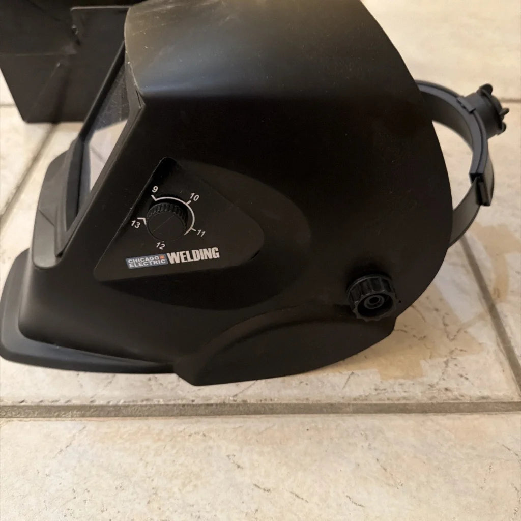 Black Chicago Electric welding helmet with adjustable shade dial