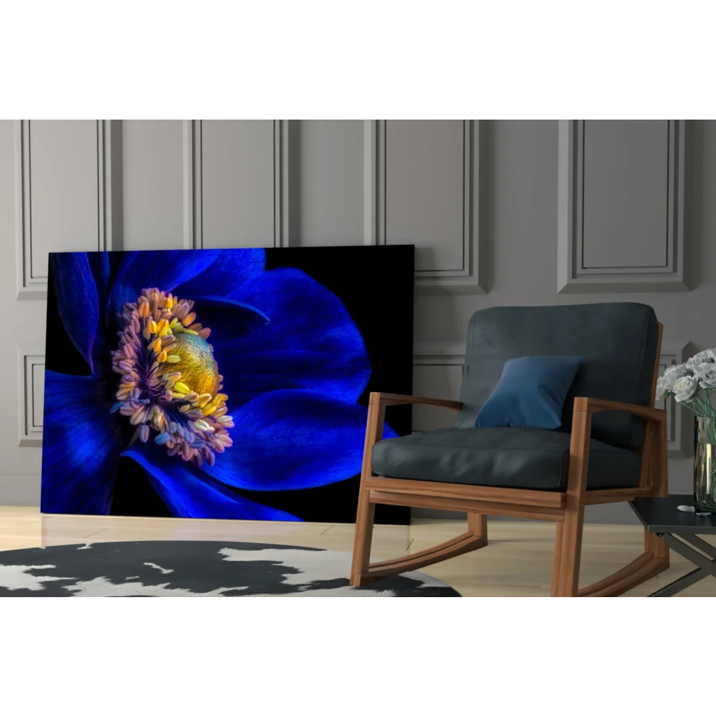 Stunning vibrant blue flower glass wall art on black canvas