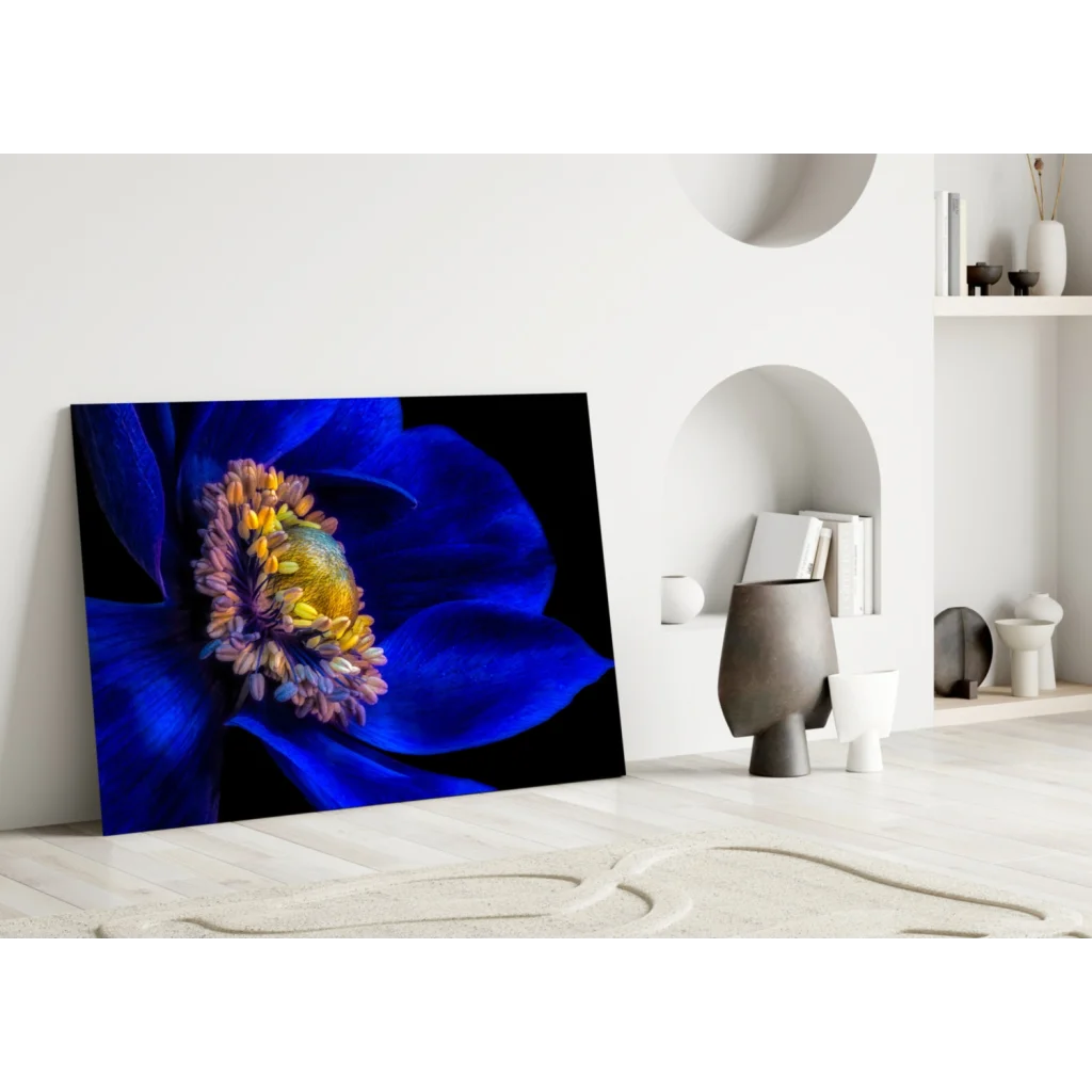 Vibrant blue flower glass wall art on black canvas with yellow purple stamens