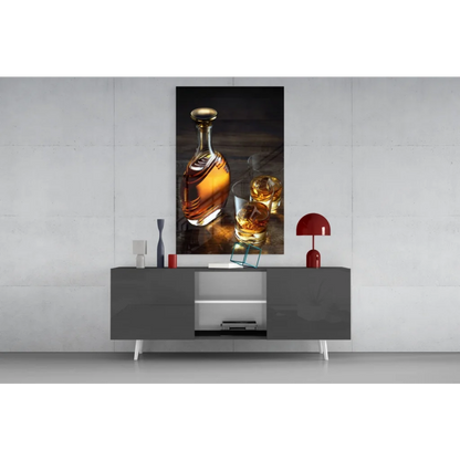 Sleek gray console table with white legs under whiskey decanter glass wall art