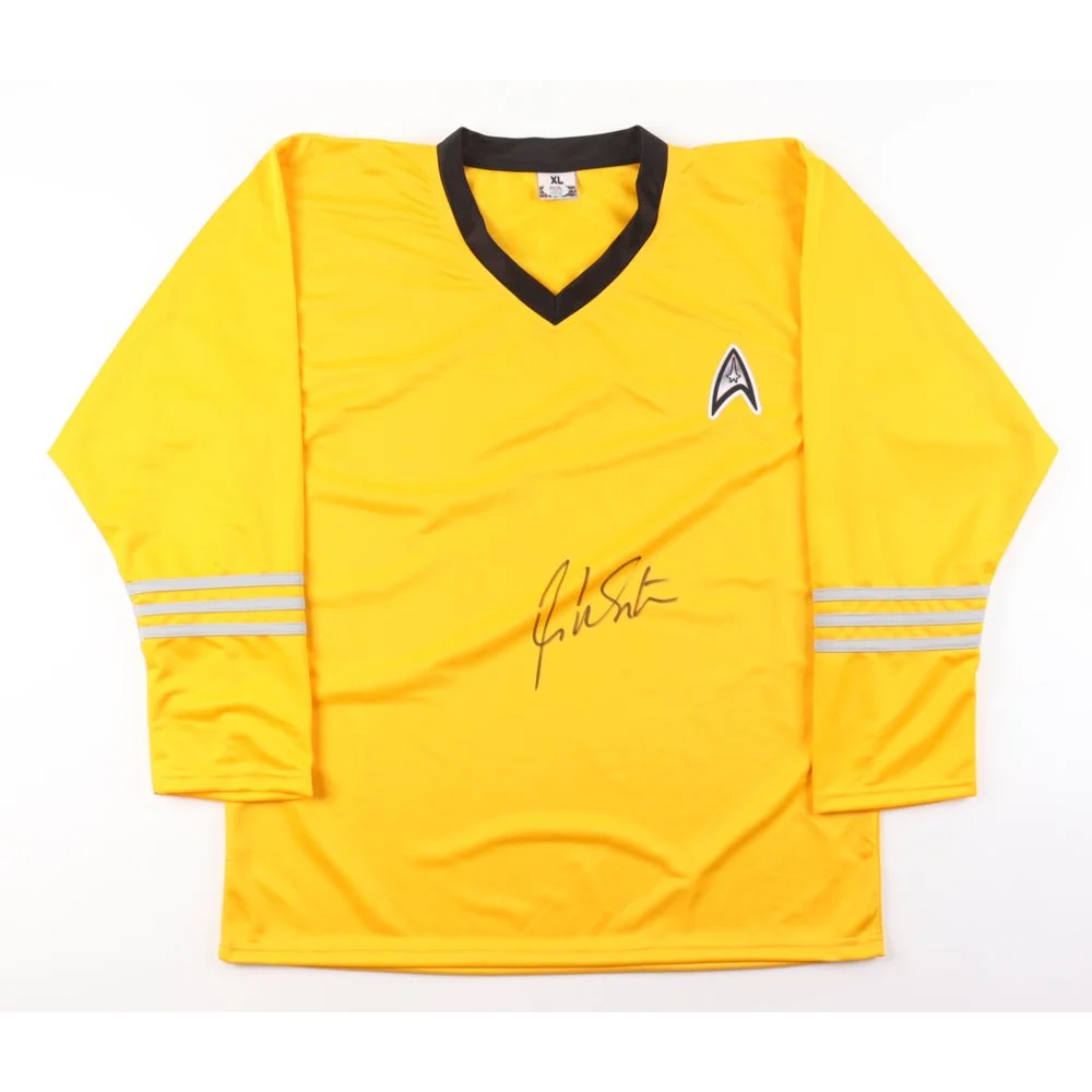 Yellow Star Trek uniform shirt signed by William Shatner with PSA authentication