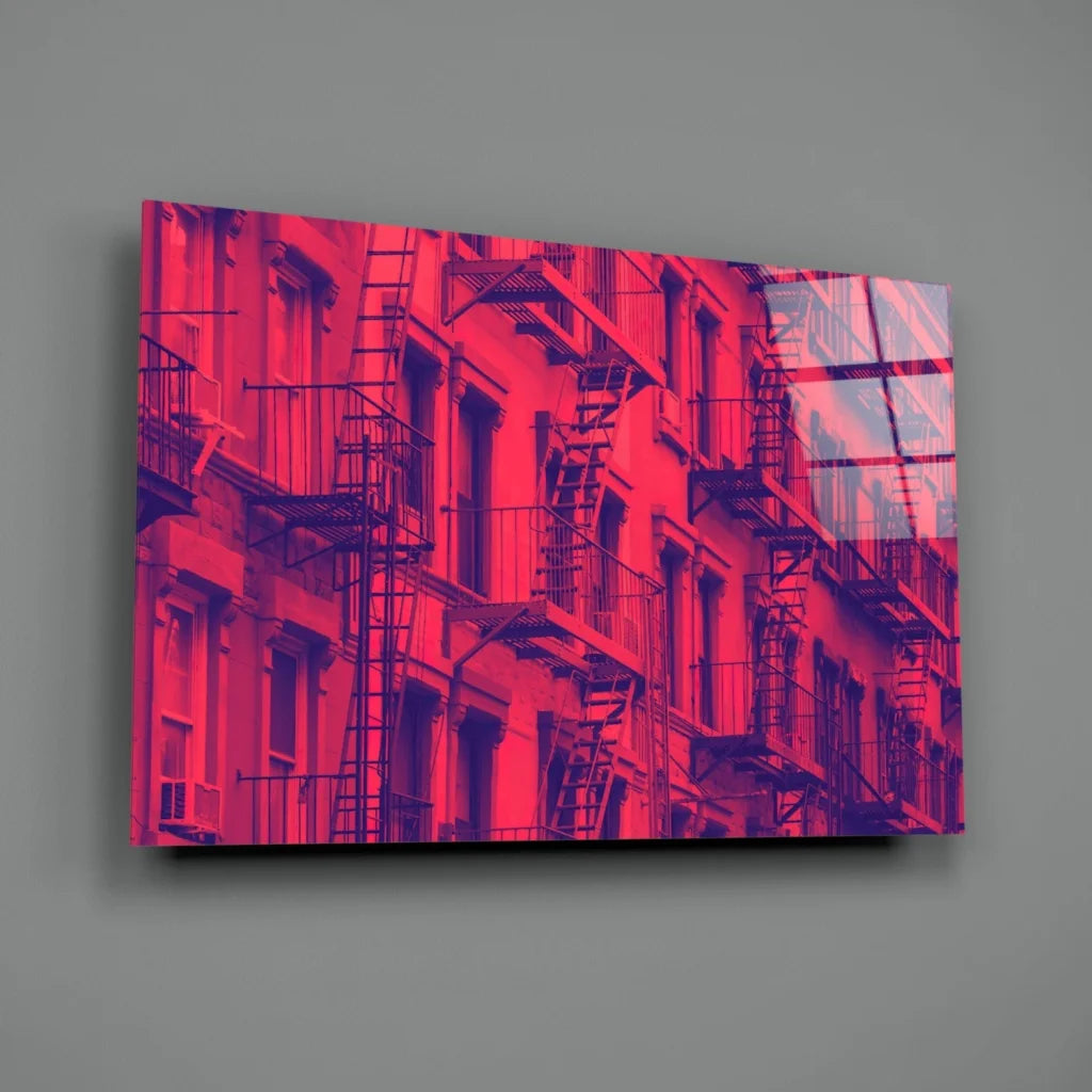 Vibrant red fire escape cityscape on sleek glass wall art panel