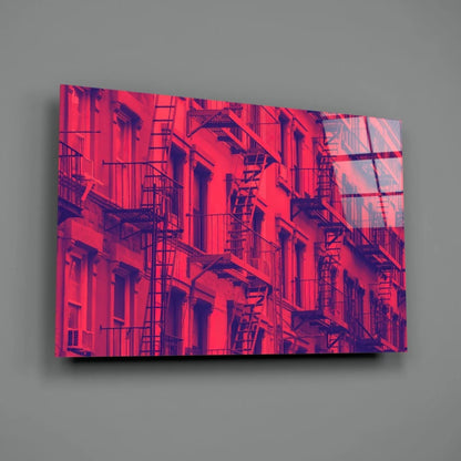 Vibrant red fire escape cityscape on sleek glass wall art panel