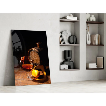 Stunning glass wall art of decanter pouring amber liquid with lemon