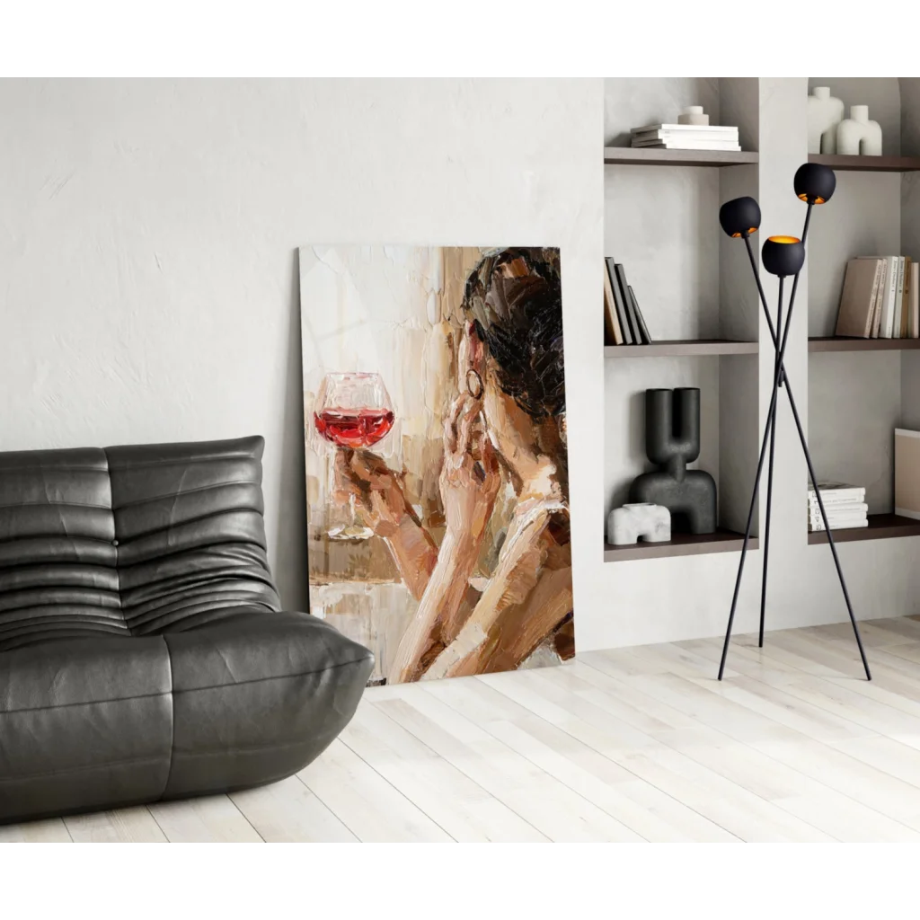 Modern abstract glass wall art of woman holding red wine in warm earthy tones