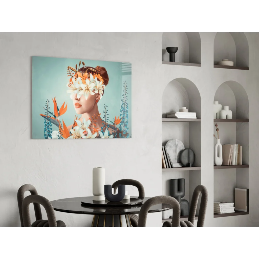 Stunning glass wall art print of woman’s face with white and orange flowers on teal background