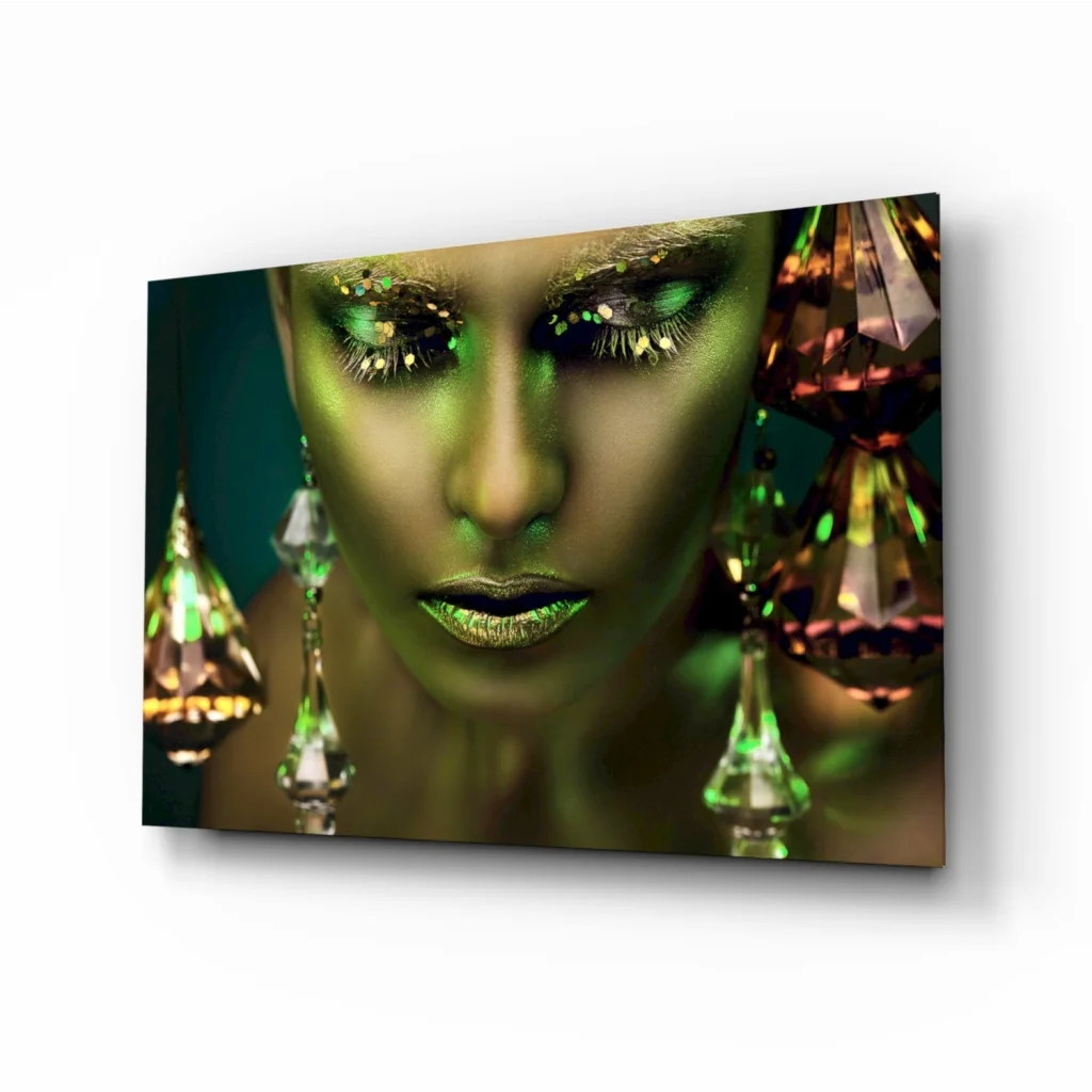 Woman with green metallic makeup in stunning tempered glass art