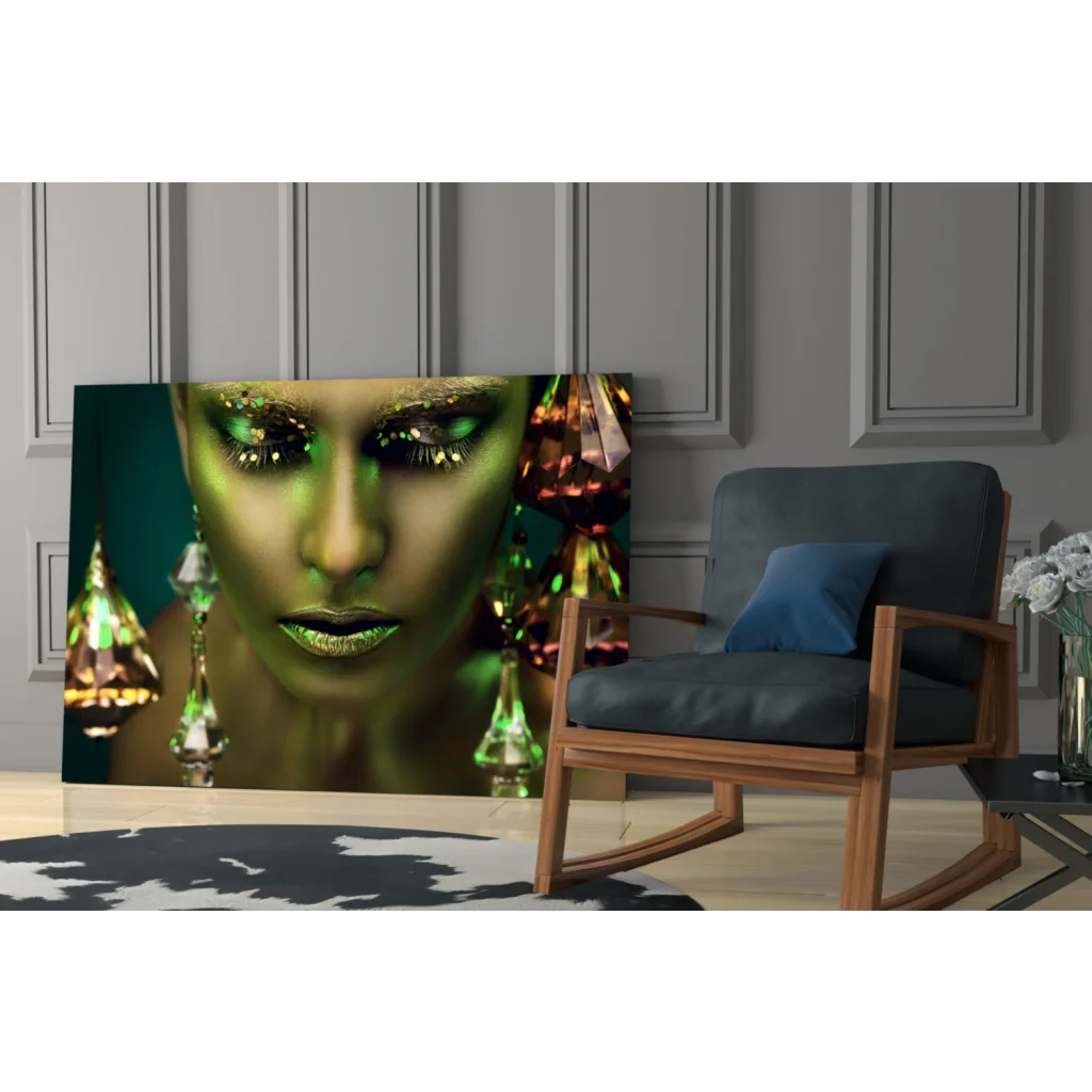Stunning tempered glass art portrait of woman with glittering green gold makeup