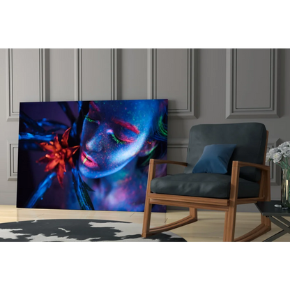 Vibrant neon blue purple canvas wall art with glowing green eyes face and red florals