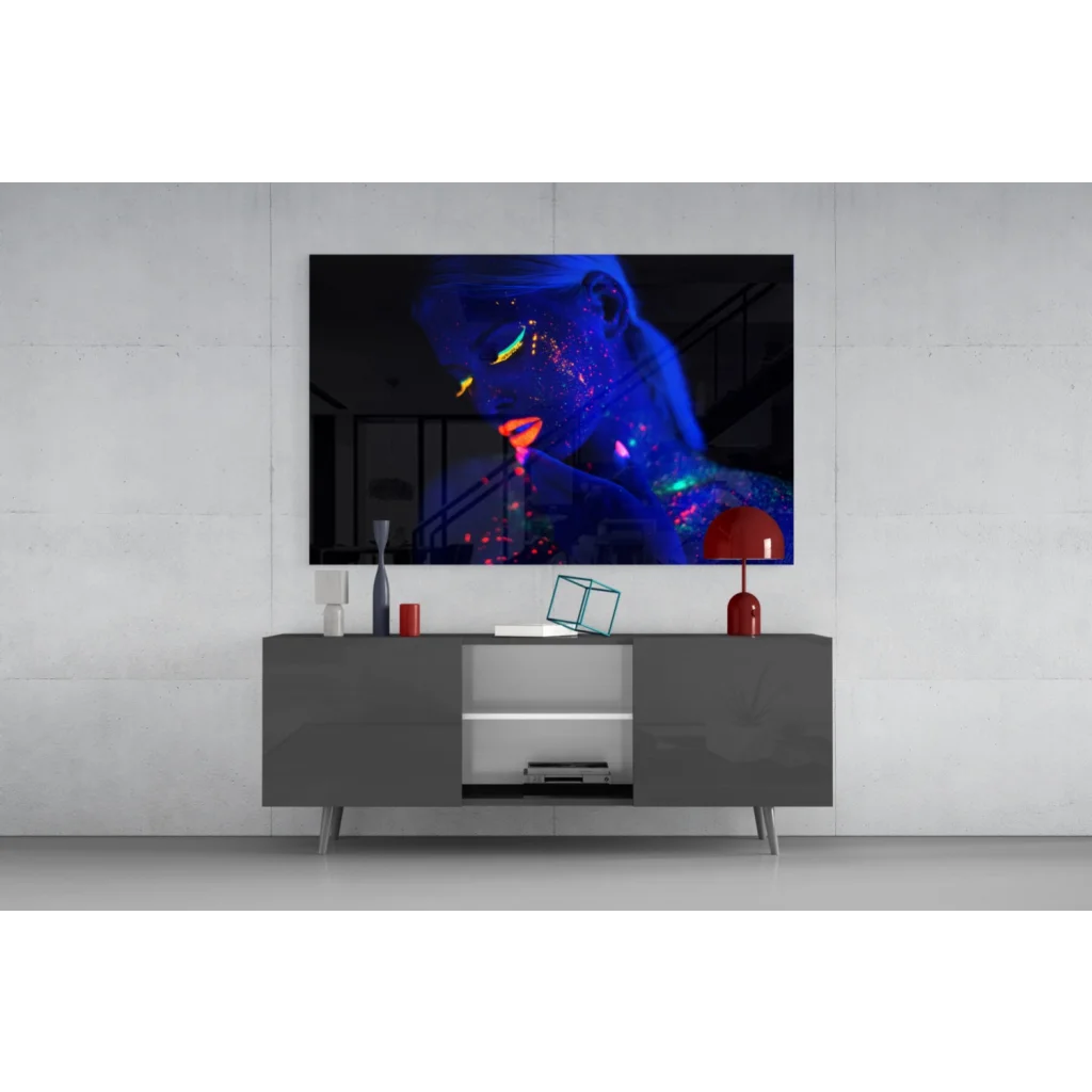 Vibrant neon woman portrait on black TV screen, glowing UV glass wall art