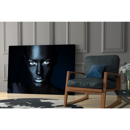 Black canvas portrait of woman with glowing white eyes and metallic silver lips wall art