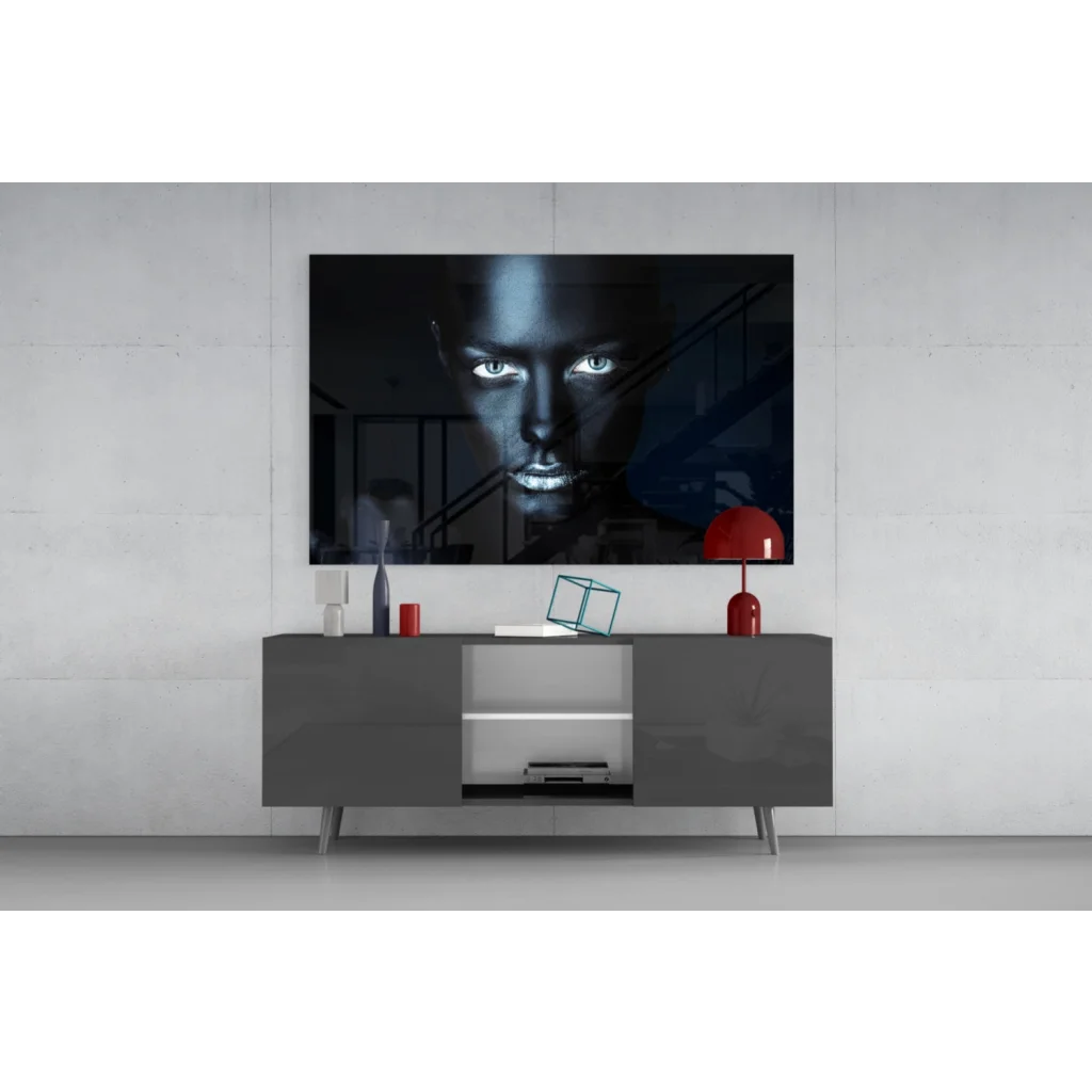 Striking black-and-white woman with glowing eyes on glass wall art TV display