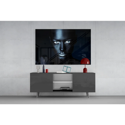 Striking black-and-white woman with glowing eyes on glass wall art TV display