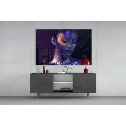 Vibrant glass wall art portrait of woman with blue gold accents