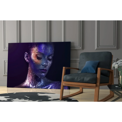 Stunning glass wall art of woman’s glittery blue face on dark canvas