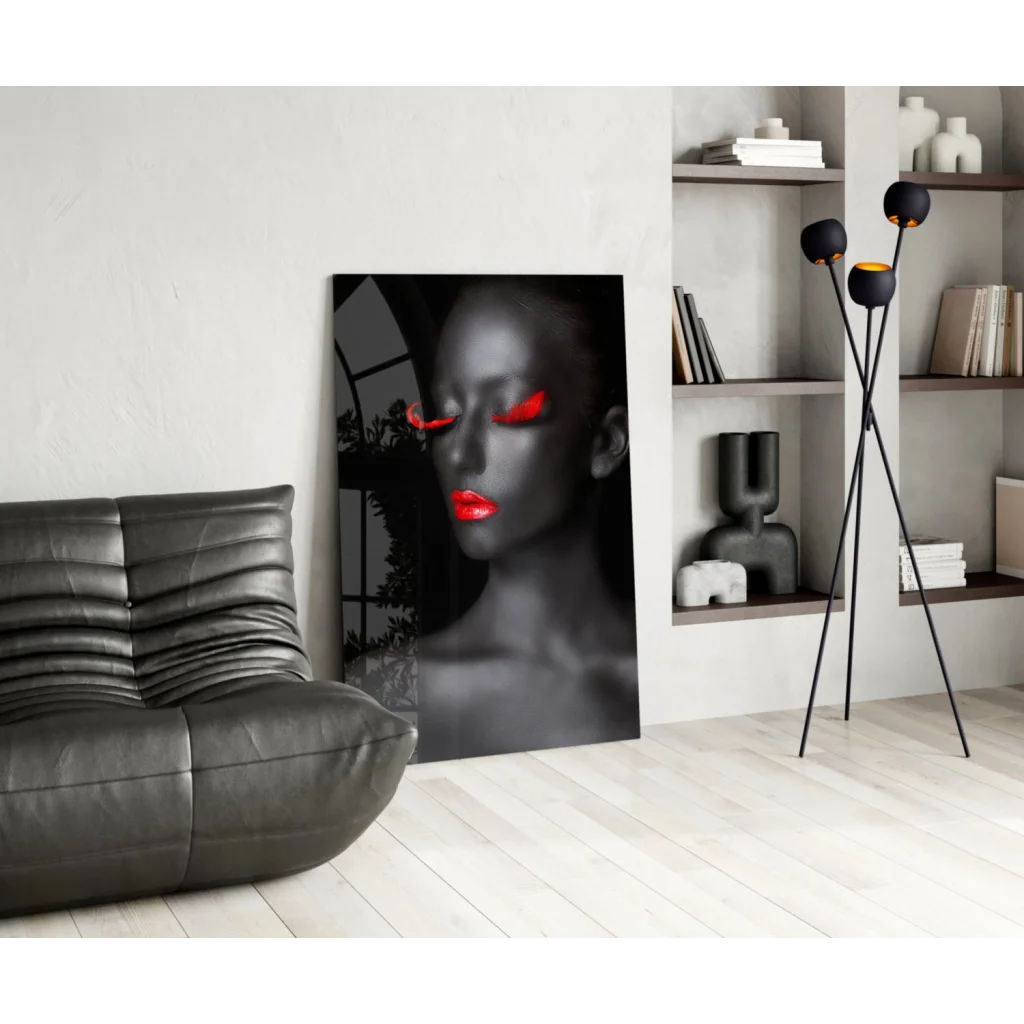 Black-and-red glass wall art portrait of woman with red eyes and lips