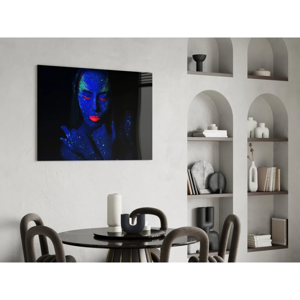 Striking black-framed canvas wall art of glowing neon woman with blue glitter makeup