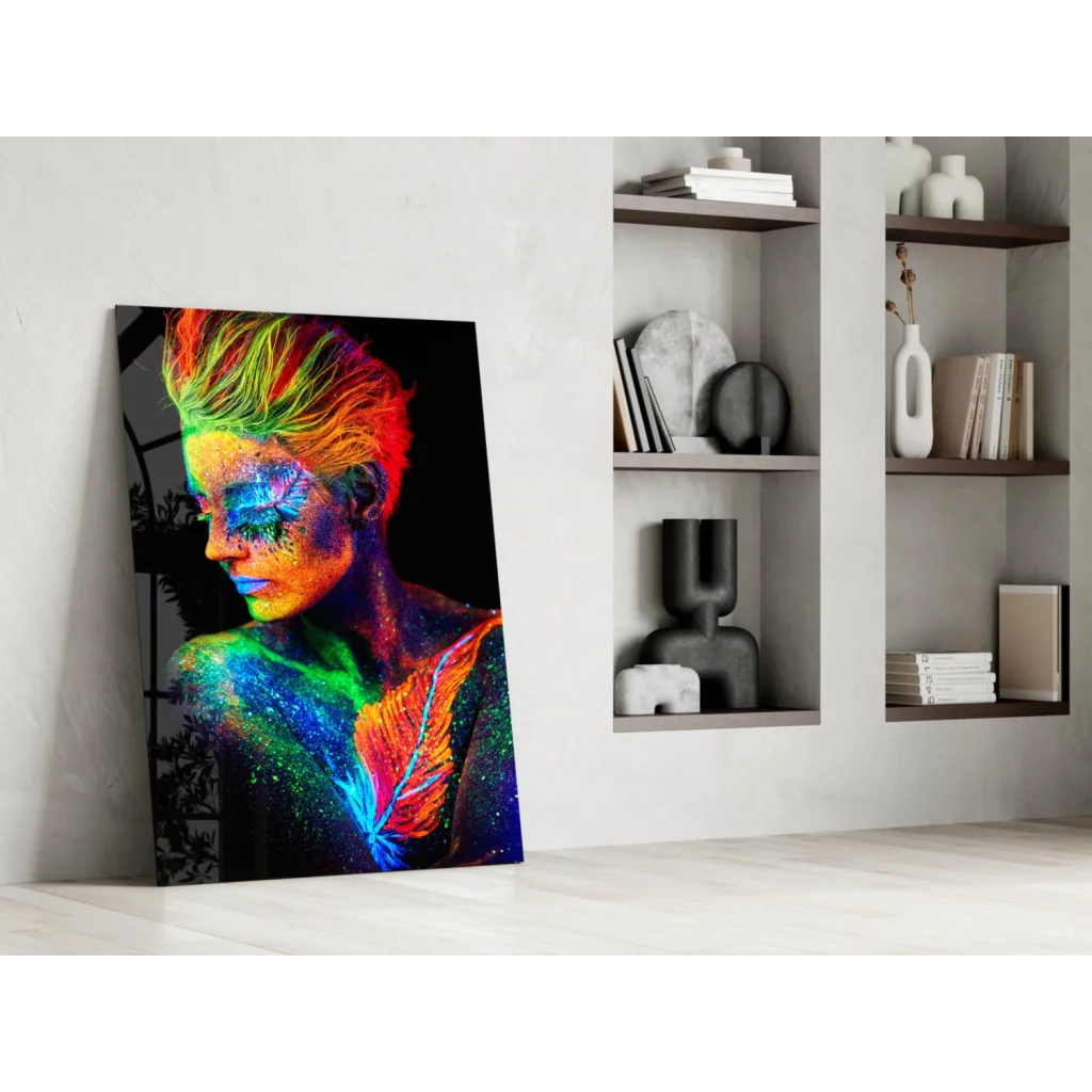 Vibrant neon glass wall art of woman with rainbow face paint and feathers