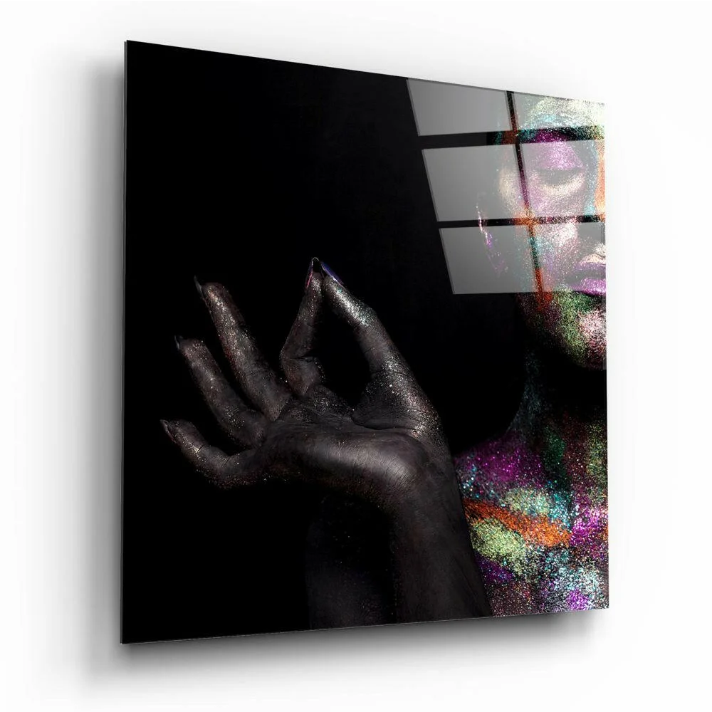 Shimmering rainbow glass wall art with black glittery handprint and sparkly face