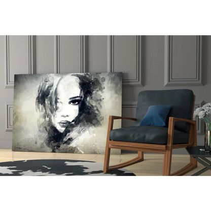 Black and white abstract watercolor portrait of expressive eyes on gray wall