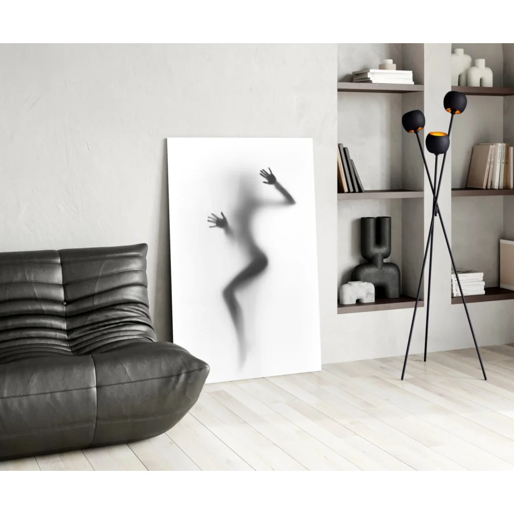 Black leather sofa in blurred silhouette glass wall art print
