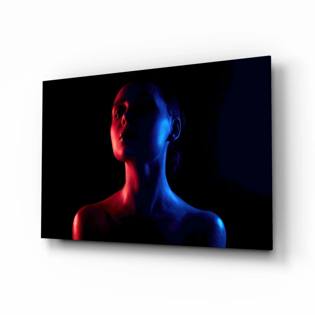 Neon silhouette glass wall art in red and blue lighting