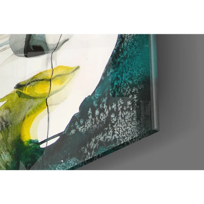 Bold abstract face glass wall art with vibrant yellow lips and teal patterns