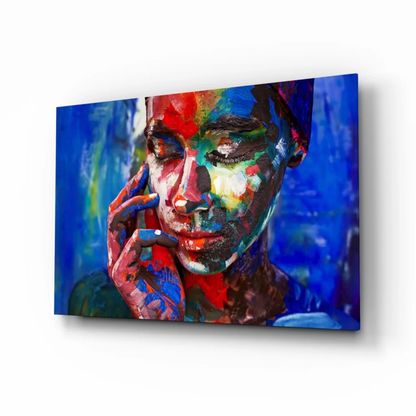 Vibrant abstract portrait canvas wall art with bold red, blue, green, black strokes on deep blue background