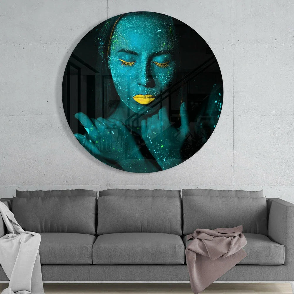 Glowing teal woman with yellow lips on tempered glass art circle