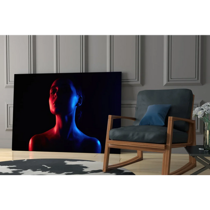 Neon silhouette glass wall art with red blue lit womans figure