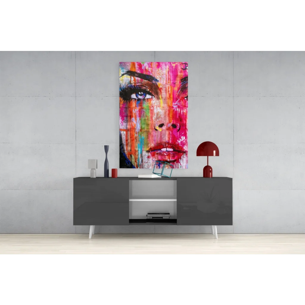 Vibrant abstract portrait glass wall art in pink, orange, blue hues