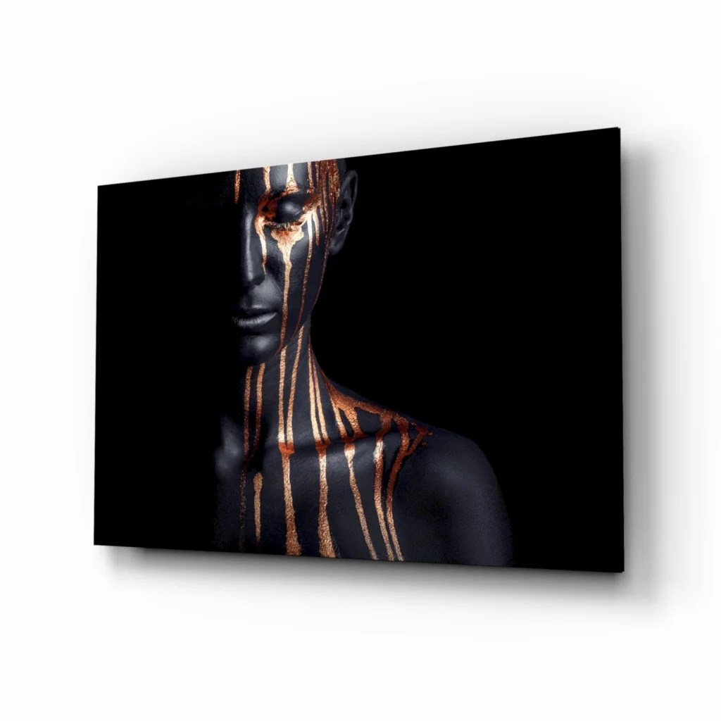 Black canvas wall art with gold drip portrait on face and neck