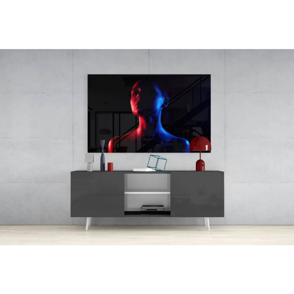 Sleek black TV displaying Neon Silhouette glass wall art in electric red and blue