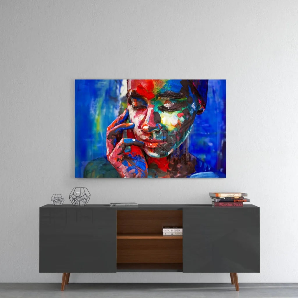 Vibrant abstract portrait wall art with bold red, blue, green strokes on canvas