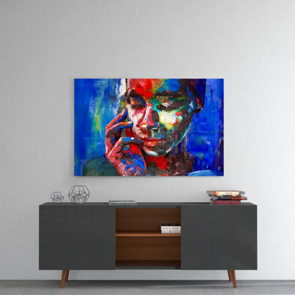 Vibrant abstract portrait wall art with bold red, blue, green strokes on canvas