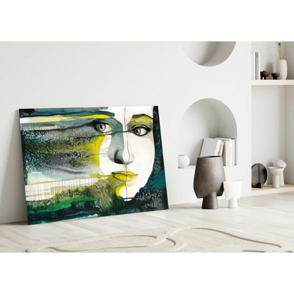 Bold abstract face glass wall art in yellow, green, teal tones