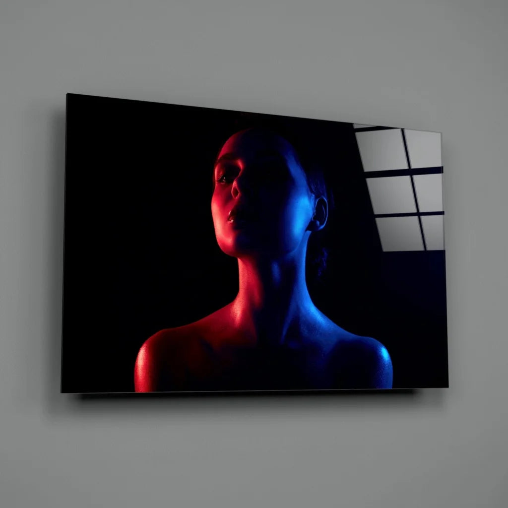 Sleek neon silhouette glass wall art in electric red and blue