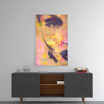 Vibrant pink and yellow glass wall art with bold abstract portrait and eye design